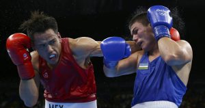 2016 Rio Olympics - Boxing - Semifinal - Men's Middle (75kg) Semifinals Bout 256 - Riocentro - Pavilion 6 - Rio de Janeiro, Brazil - 18/08/2016. Misael Rodriguez (MEX) of Mexico and Bektemir Melikuziev (UZB) of Uzbekistan compete.  REUTERS/Peter Cziborra FOR EDITORIAL USE ONLY. NOT FOR SALE FOR MARKETING OR ADVERTISING CAMPAIGNS.