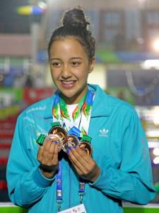 Swimmer Gaurika Singh pose for photo with medals in Sillong, Inda on Wednesday, February 10, 2016. Photo: Mahesh Acharya