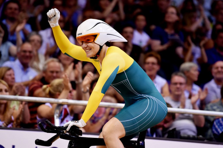 Australian cyclist Anna Meares celebrates her win in the track cycling 500m time trial final at Sir Chris Hoy Velodrome during the Commonwealth Games, Glasgow, Scotland, Thursday, July 24, 2014. (AAP Image/Tracey Nearmy) NO ARCHIVING, EDITORIAL USE ONLY