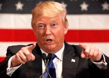 U.S. Republican presidential candidate businessman Donald Trump speaks at a veteran's rally in Des Moines, Iowa January 28, 2016. REUTERS/Rick Wilking  - RTX24HM9