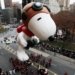 NEW YORK - NOVEMBER 25:  The Snoopy float glides down Central Park South during the Macy's Thanksgiving Day parade  November 25, 2010 in New York City. This year's annual parade features approximately 8,000 participants, 15 giant character balloons and 43 novelty balloons.  (Photo by Chris Hondros/Getty Images)