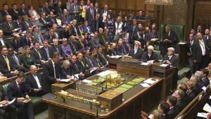 In this image taken from video, Britain's Prime Minister David Cameron, front left, stands to speak to the assembled parliament during a debate on Syria, in Britain's parliament, London, Thursday Aug. 29, 2013. Britain's leaders said Thursday it would be legal under humanitarian doctrine to launch a military strike against Syria even without authorization from the United Nations Security Council, but it is not certain how much support there is for the government's resolution on Syria. (AP Photo / PA) UNITED KINGDOM OUT - NO SALES - NO ARCHIVES