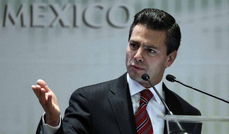 Former Mexico state governor Enrique Pena Nieto, a potential presidential candidate for the opposition Institutional Revolutionary Party (PRI), speaks during a Confederation of National Chambers of Commerce, Mexico (Concanaco) event in Mexico City November 25, 2011. Pena Nieto, the frontrunner in Mexico's 2012 presidential race, on November 27, 2011 registered in Mexico City as the official presidential candidate of the PRI. Picture taken November 25, 2011. REUTERS/Henry Romero (MEXICO - Tags: POLITICS ELECTIONS) ORG XMIT: HNR05