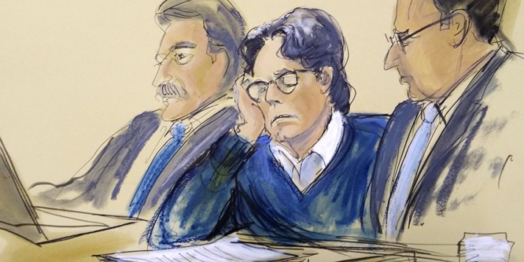 In this courtroom artist's sketch, defendant Keith Raniere, center, sits with attorneys Paul DerOhannesian, left, and Marc Agnifilo during closing arguments at Brooklyn federal court, Tuesday, June 18, 2019 in New York. A federal prosecutor said Raniere used his NXIVM organization to "tap into a never-ending flow of women and money." Attorneys for the defendant say he had no criminal intent and that his sexual encounters with followers were consensual. (Elizabeth Williams via AP)