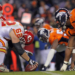 DENVER - NOVEMBER 14:  Center Casey Wiegman #62 of the Kansas City Chiefs snaps the ball as the Chiefs offensive line takes on the defensive line of the Denver Bronco at INVESCO Field at Mile High on November 14, 2010 in Denver, Colorado. The Broncos defeated the Cheifs 49-29.  (Photo by Doug Pensinger/Getty Images)