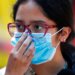A teen wears a medical mask as a precaution against the spread of the new coronavirus, during an outing in Mexico City, Saturday, Feb. 29, 2020. Mexico’s Health Department said late Friday that a new case had been confirmed in Mexico City, adding to the first two confirmed cases announced earlier that day.  (AP Photo/Marco Ugarte)