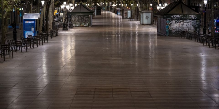 Las Ramblas of Barcelona are pictured after curfew on Sunday, Oct. 25, 2020. Spain orders nationwide curfew to stem worsening outbreak. Spanish Prime Minister Pedro Sánchez has declared a second nationwide state of emergency in hopes of stemming a resurgence in coronavirus infections. (AP Photo/Emilio Morenatti)