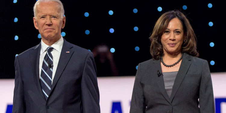 July 31, 2019 - Detroit, Michigan, U.S. - JOE BIDEN and KAMALA HARRIS pose for the photo spray during a commercial break at the second of two Democratic Debates in Detroit hosted by CNN and sanctioned by the DNC.(Credit Image: © Brian Cahn/ZUMA Wire)